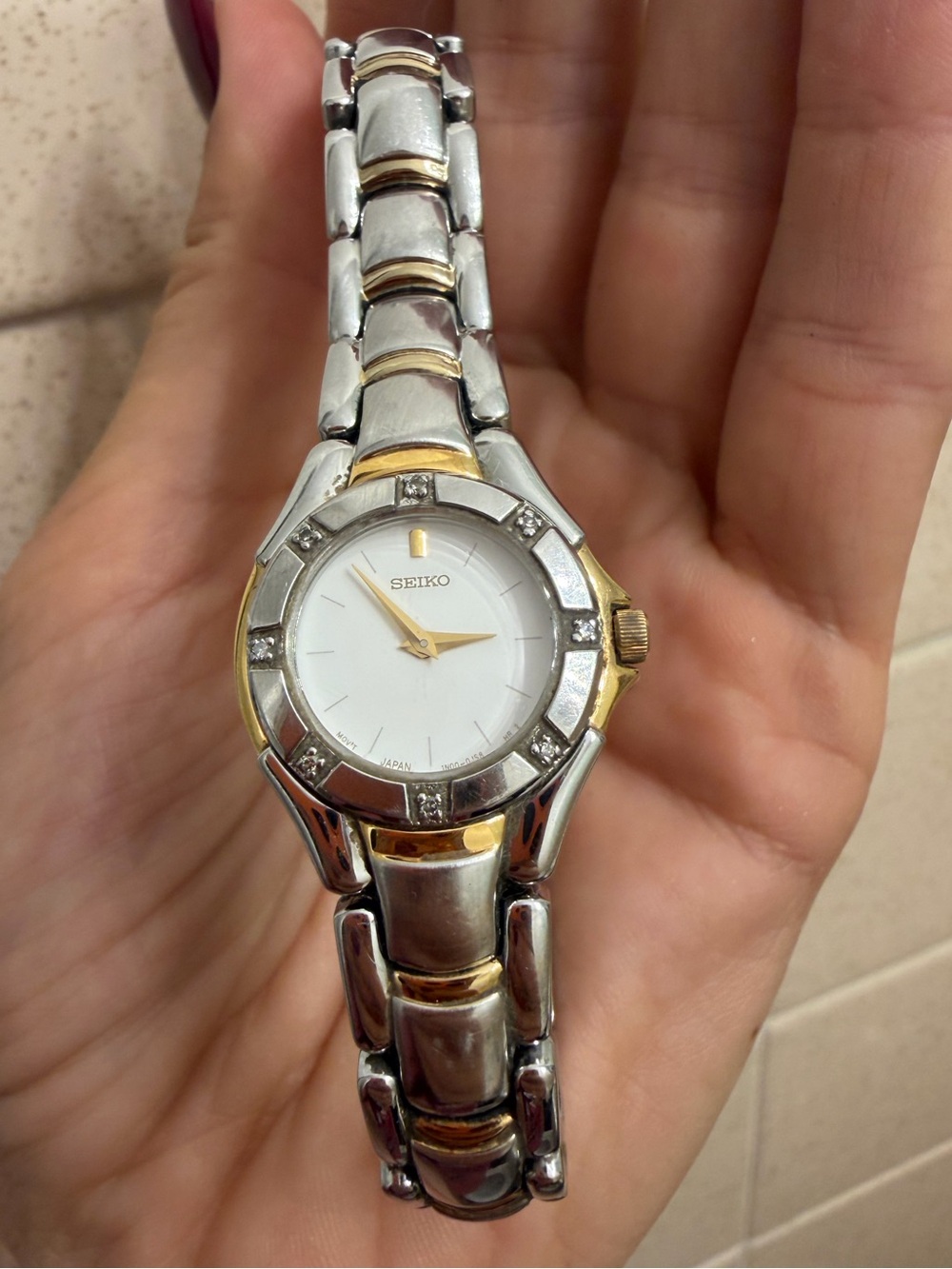 Vintage Seiko Silver and Gold Women's Bracelet Watch with White Dial
